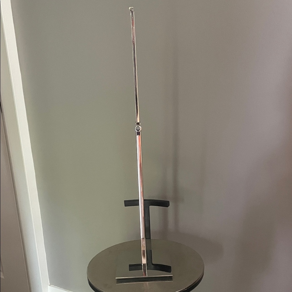 Sleek Silver Modern adjustable display for selling your POSH items.